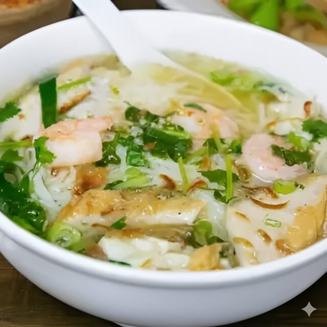 Combination Seafood Rice Noodle Chicken Soup.