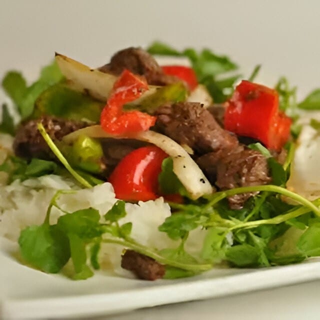 Tank's Shaken Beef Over Rice.
